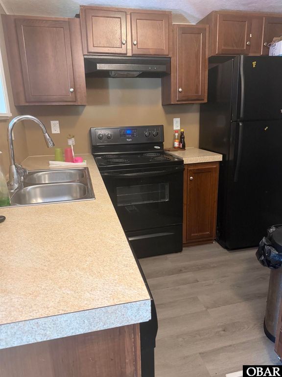 Image 11 of property listing at 833 Lindbergh Berry Road, Manteo, NC 27954