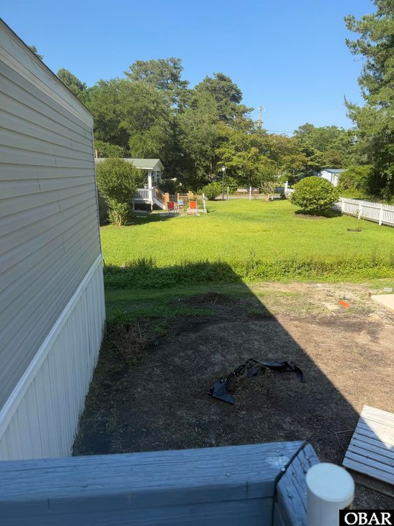 Image 13 of property listing at 833 Lindbergh Berry Road, Manteo, NC 27954