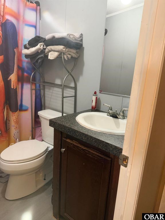 Image 8 of property listing at 833 Lindbergh Berry Road, Manteo, NC 27954