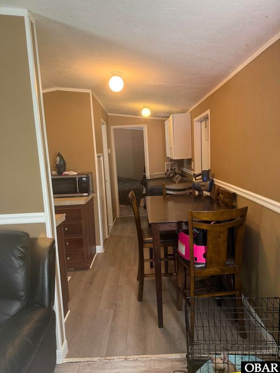 Image 10 of property listing at 833 Lindbergh Berry Road, Manteo, NC 27954