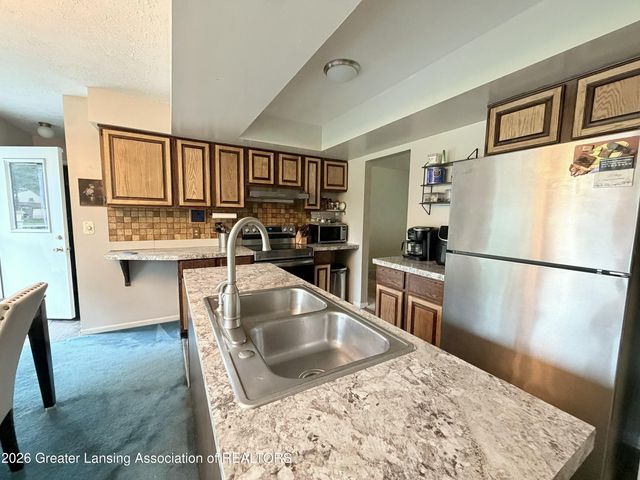 451 Park Meadows Drive, Lansing, MI 48917