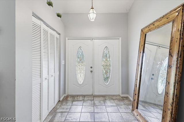 115 Robert AVE, Lehigh Acres, FL 33936