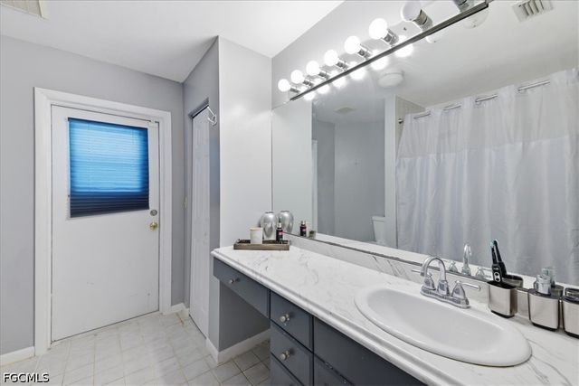 115 Robert AVE, Lehigh Acres, FL 33936