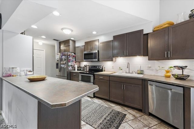 115 Robert AVE, Lehigh Acres, FL 33936