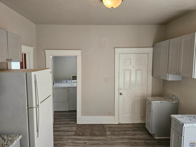 1115 SW Plass AVE, Topeka, KS 66604