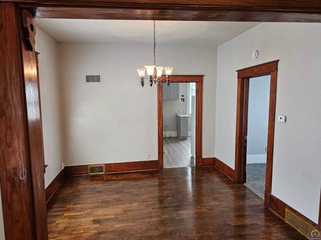 1115 SW Plass AVE, Topeka, KS 66604