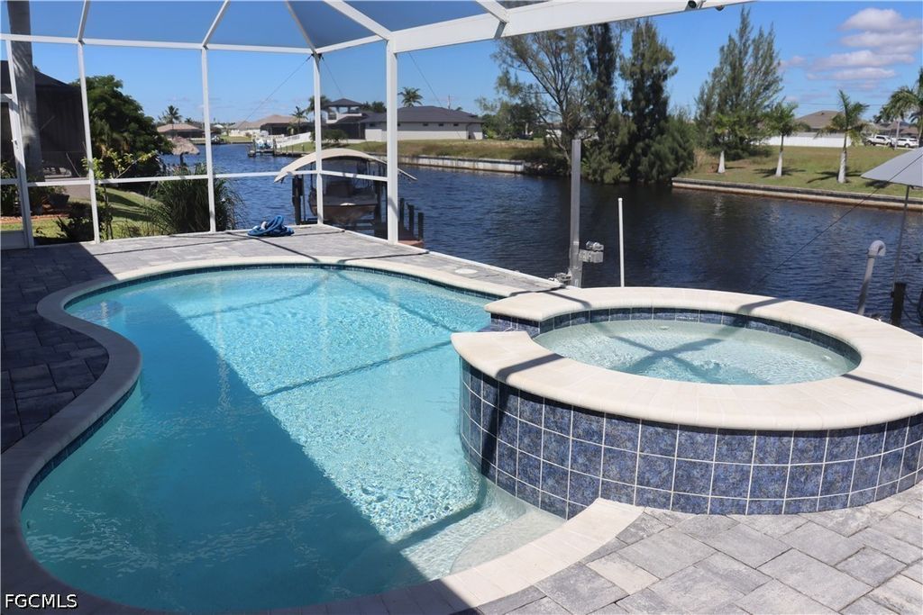 Image 1 of property listing at 1857 NW 36th PL, Cape Coral, FL 33993