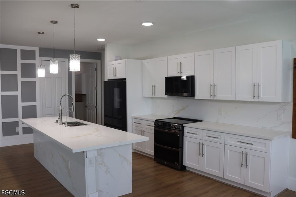 Image 12 of property listing at 1857 NW 36th PL, Cape Coral, FL 33993