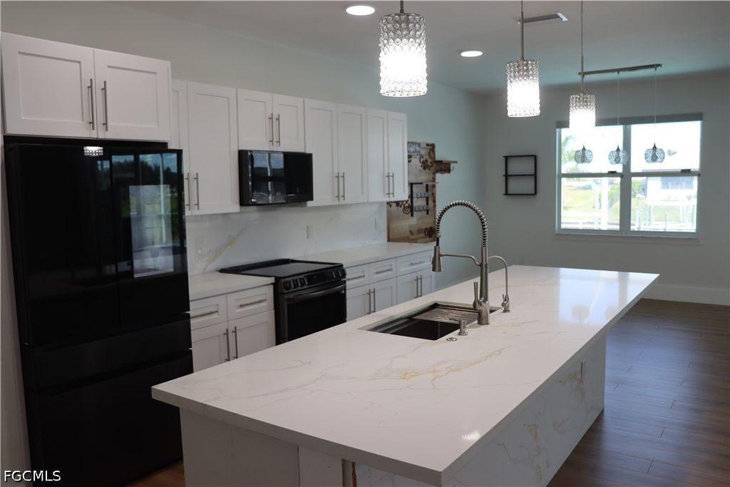 Image 9 of property listing at 1857 NW 36th PL, Cape Coral, FL 33993