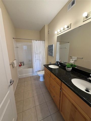 5254 CANE ISLAND LOOP 204, Kissimmee, FL 34746