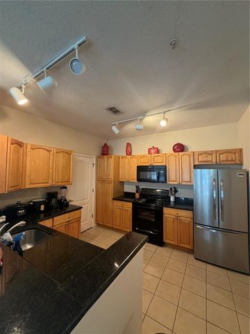 5254 CANE ISLAND LOOP 204, Kissimmee, FL 34746