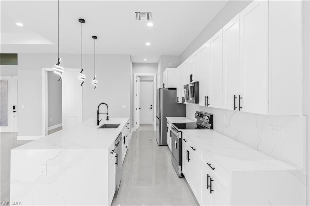 Image 15 of property listing at 2830 NW 41st AVE, Cape Coral, FL 33993