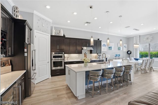 8876 Spotted Towhee DR, Naples, FL 34120