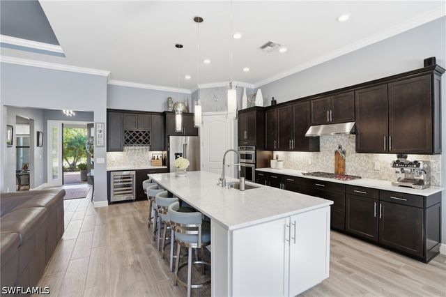 8876 Spotted Towhee DR, Naples, FL 34120