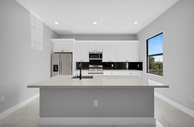 1225 NE 5th PL, Cape Coral, FL 33909