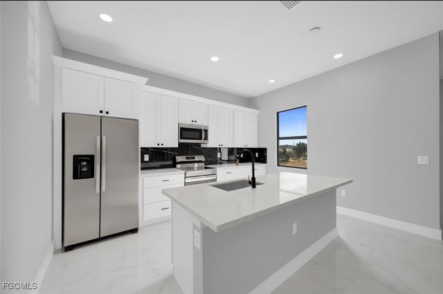 1225 NE 5th PL, Cape Coral, FL 33909