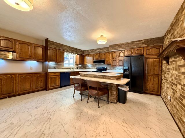 5012 Tressa Drive, Lansing City, MI 48910