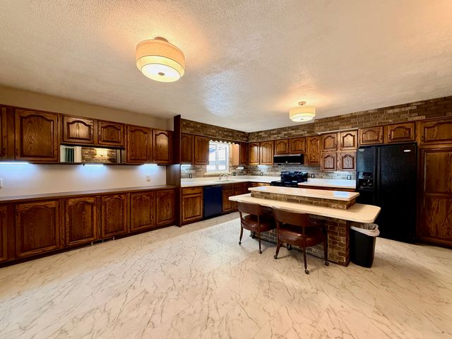 5012 Tressa Drive, Lansing City, MI 48910