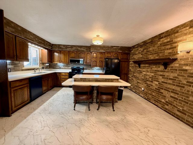 5012 Tressa Drive, Lansing City, MI 48910