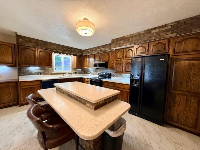 5012 Tressa Drive, Lansing City, MI 48910