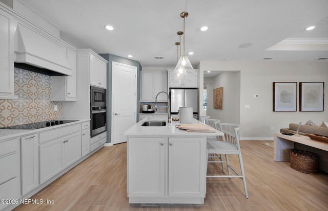 908 ROOSTER HOLLOW Way, Middleburg, FL 32068