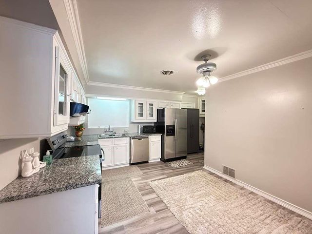 6833 Bellaire Boulevard, Houston, TX 77074