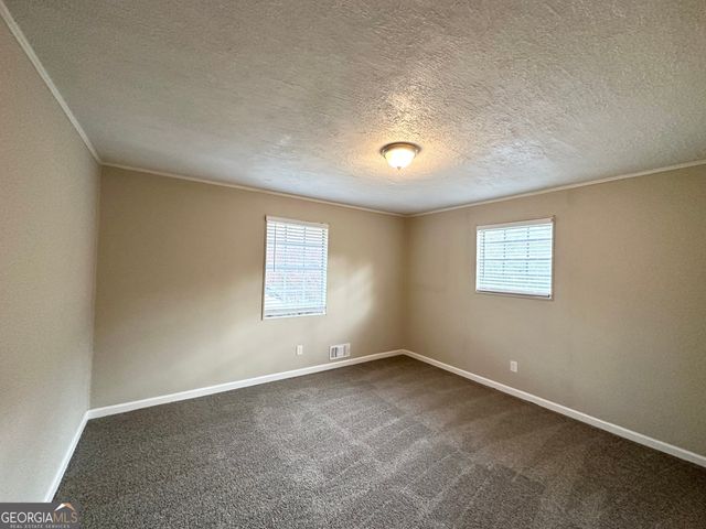 4395 Stonewall Tell Road, College Park, GA 30349