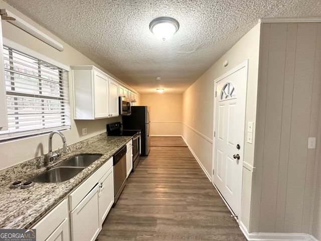 4395 Stonewall Tell Road, College Park, GA 30349