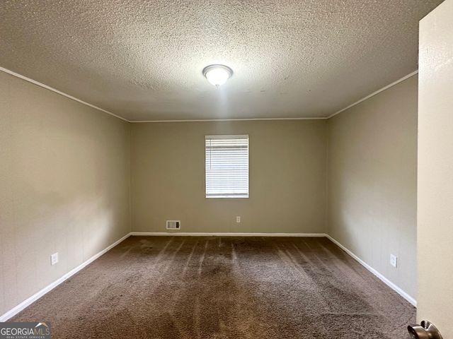 4395 Stonewall Tell Road, College Park, GA 30349