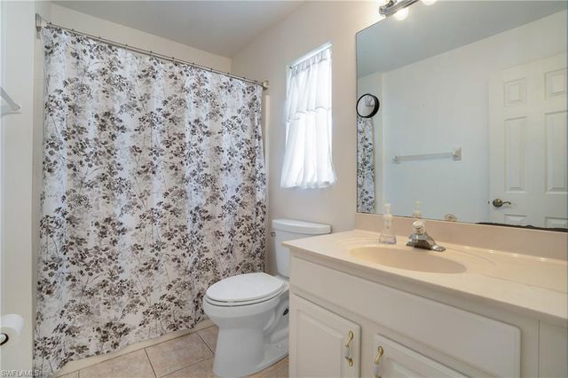 320 Spider Lily LN, Naples, FL 34119