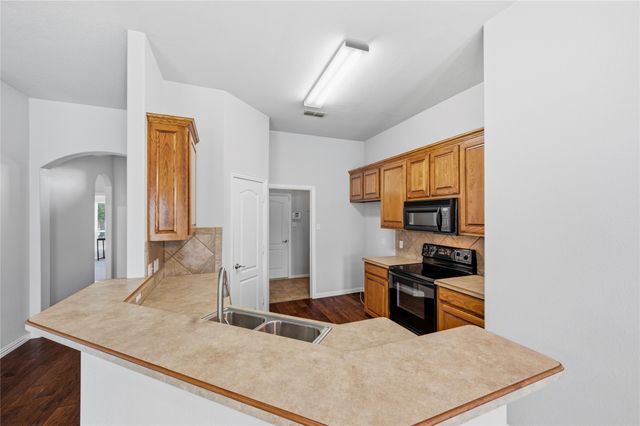 9025 River Falls Drive, Fort Worth, TX 76118
