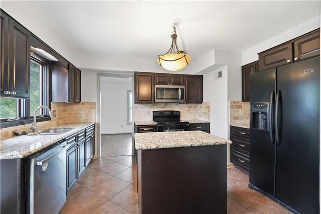 701 NE Burning Tree Street, Lee's Summit, MO 64064