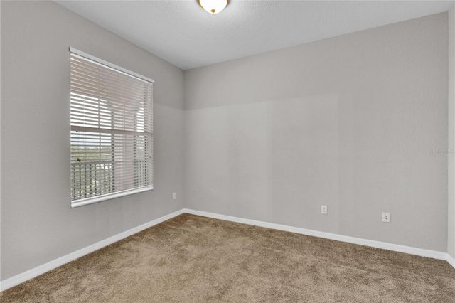8306 PORTOFINO DRIVE 404, Davenport, FL 33896
