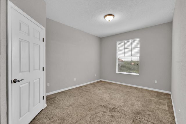 8306 PORTOFINO DRIVE 404, Davenport, FL 33896