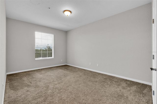 8306 PORTOFINO DRIVE 404, Davenport, FL 33896