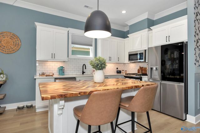 6202 Pembrook Pond Place SE, Owens Cross Roads, AL 35763