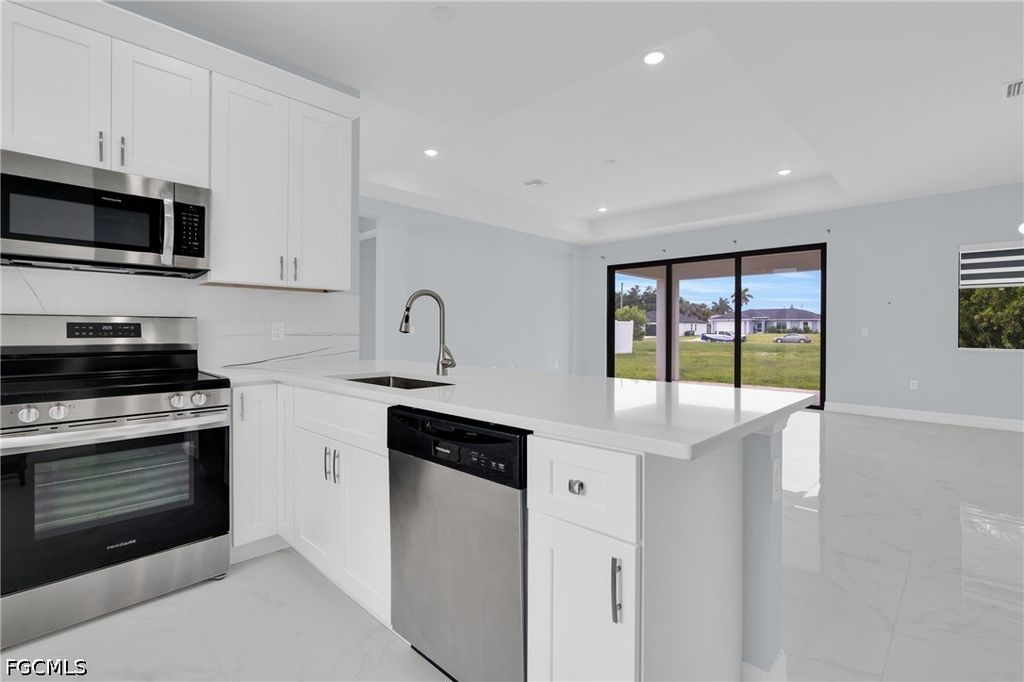 Image 10 of property listing at 627 NW 2nd TER, Cape Coral, FL 33993