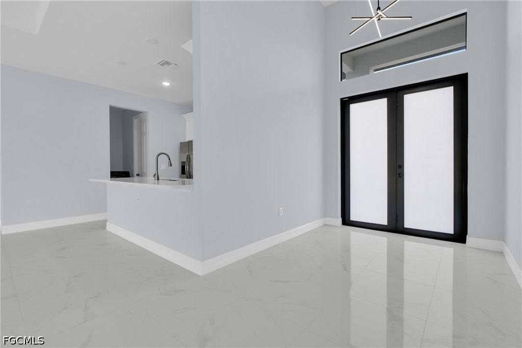Image 7 of property listing at 627 NW 2nd TER, Cape Coral, FL 33993