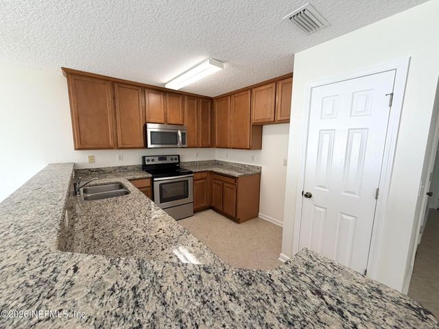 1500 CALMING WATER Drive 5202, Fleming Island, FL 32003