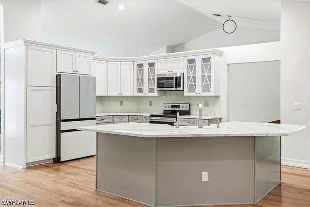 5991 Golden Oaks LN, Naples, FL 34119