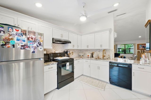 497 Iron Forge Court, Royal Palm Beach, FL 33411