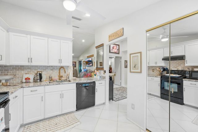 497 Iron Forge Court, Royal Palm Beach, FL 33411