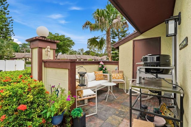 497 Iron Forge Court, Royal Palm Beach, FL 33411