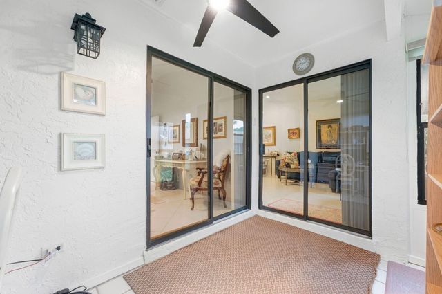 497 Iron Forge Court, Royal Palm Beach, FL 33411
