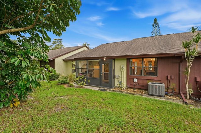497 Iron Forge Court, Royal Palm Beach, FL 33411