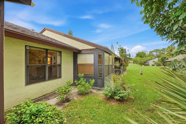 497 Iron Forge Court, Royal Palm Beach, FL 33411