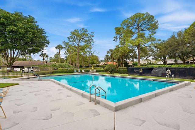 497 Iron Forge Court, Royal Palm Beach, FL 33411