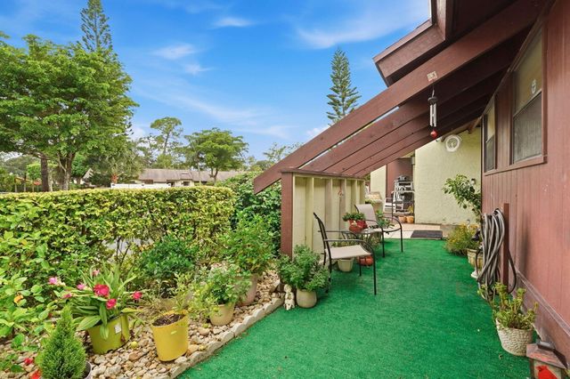 497 Iron Forge Court, Royal Palm Beach, FL 33411