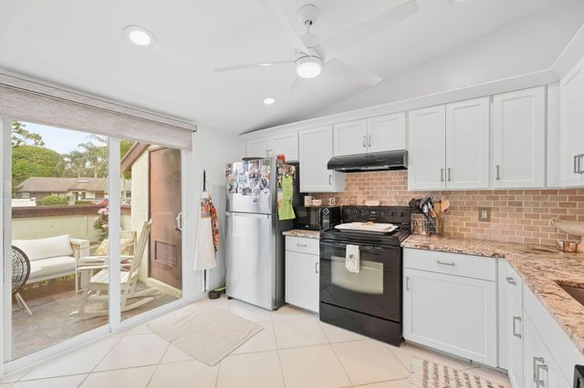497 Iron Forge Court, Royal Palm Beach, FL 33411
