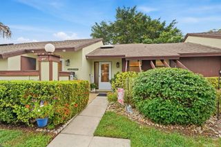 497 Iron Forge Court, Royal Palm Beach, FL 33411